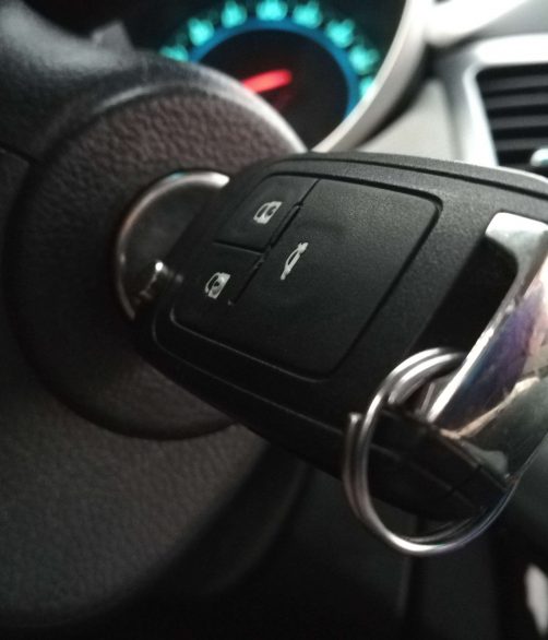 Close-up remote control car key while engine starting